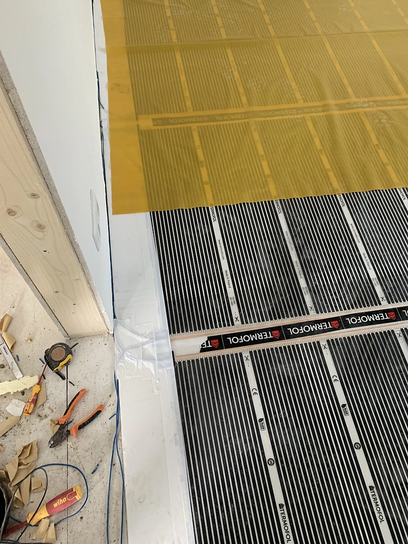 Práce v portfoliu - instalace teplé podlahy - fotografie 3