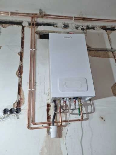 Práce v portfoliu - Rekonstrukce bytu- Nové topení a rozvody vody