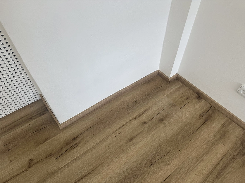 Práce v portfoliu - Pokládka plovoucí podlahy - fotografie 4